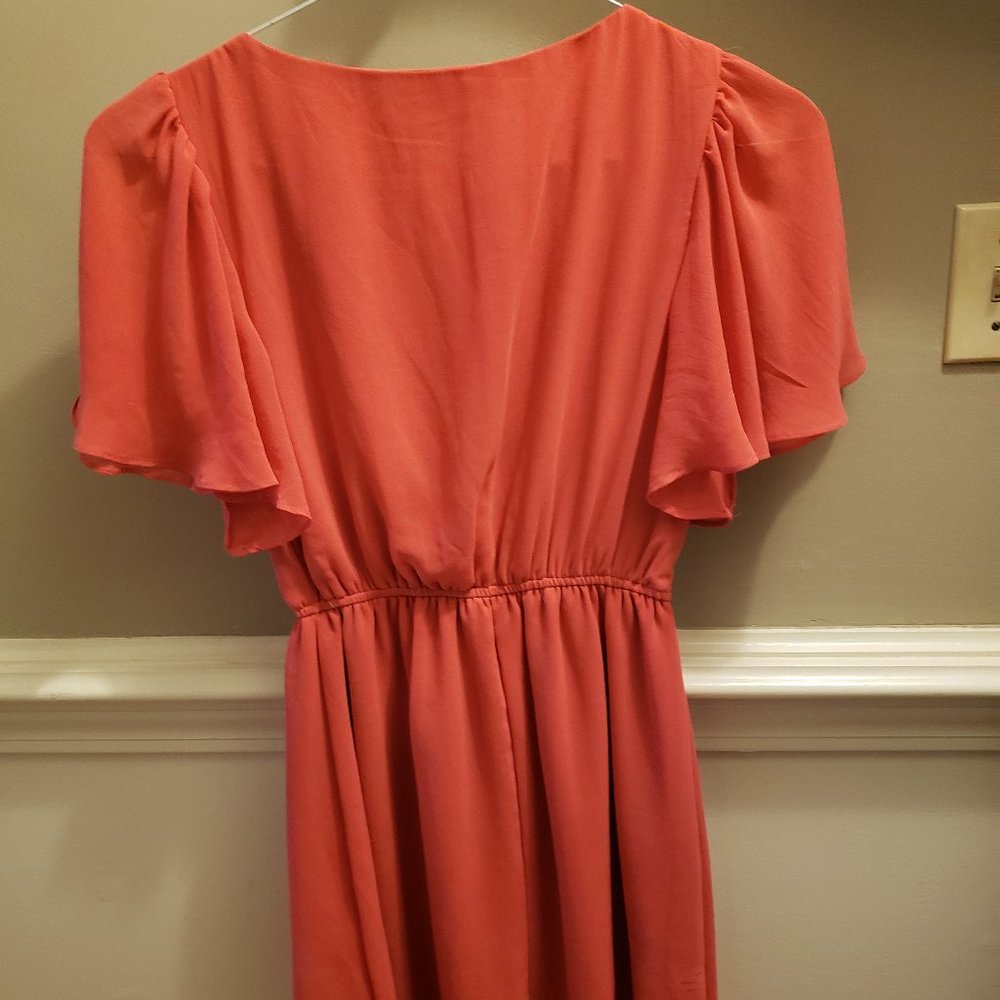 Coral loose fitting flowy party dress! 👗